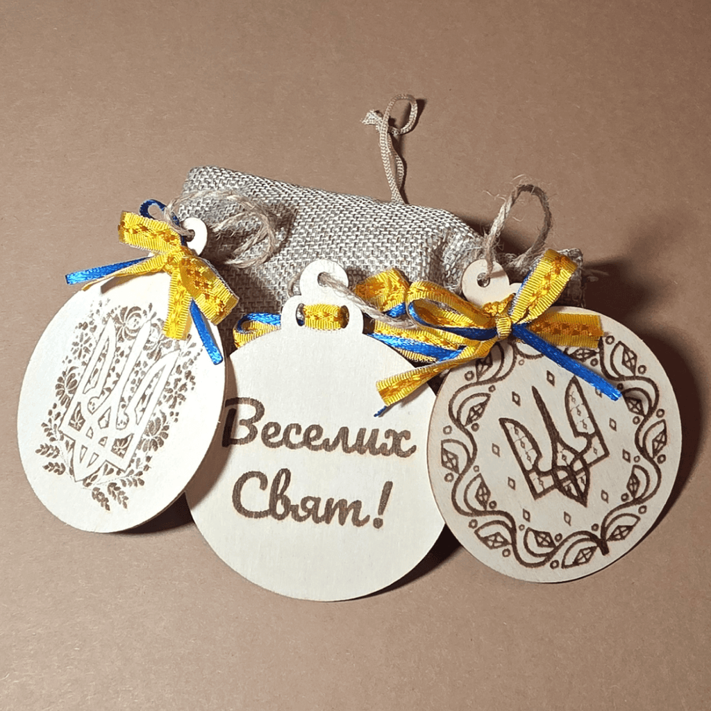 Ukrainian wooden ornaments with blue-yellow ribbons and gift pouch