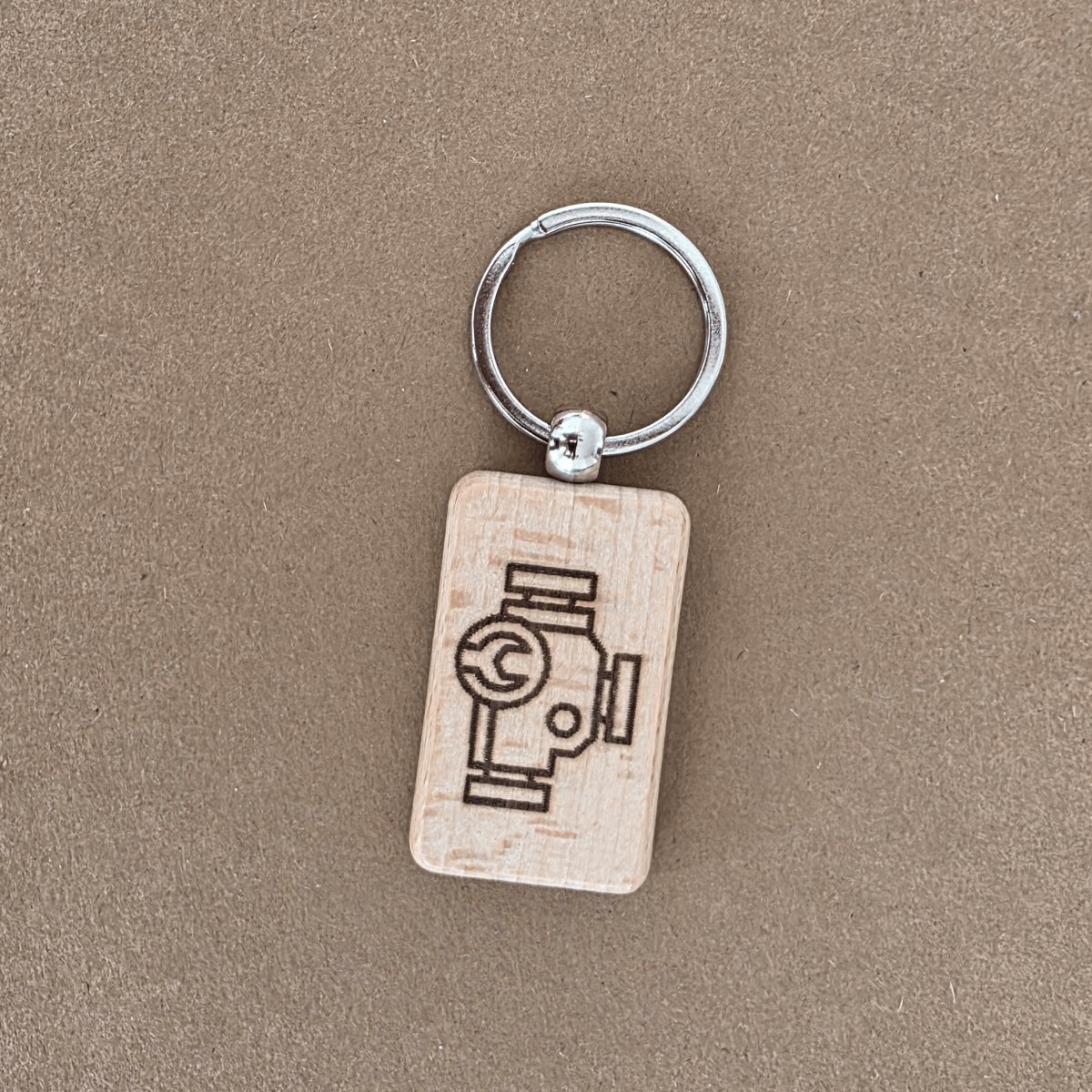 Beech wooden keychain with laser-engraved service/maintenance icon