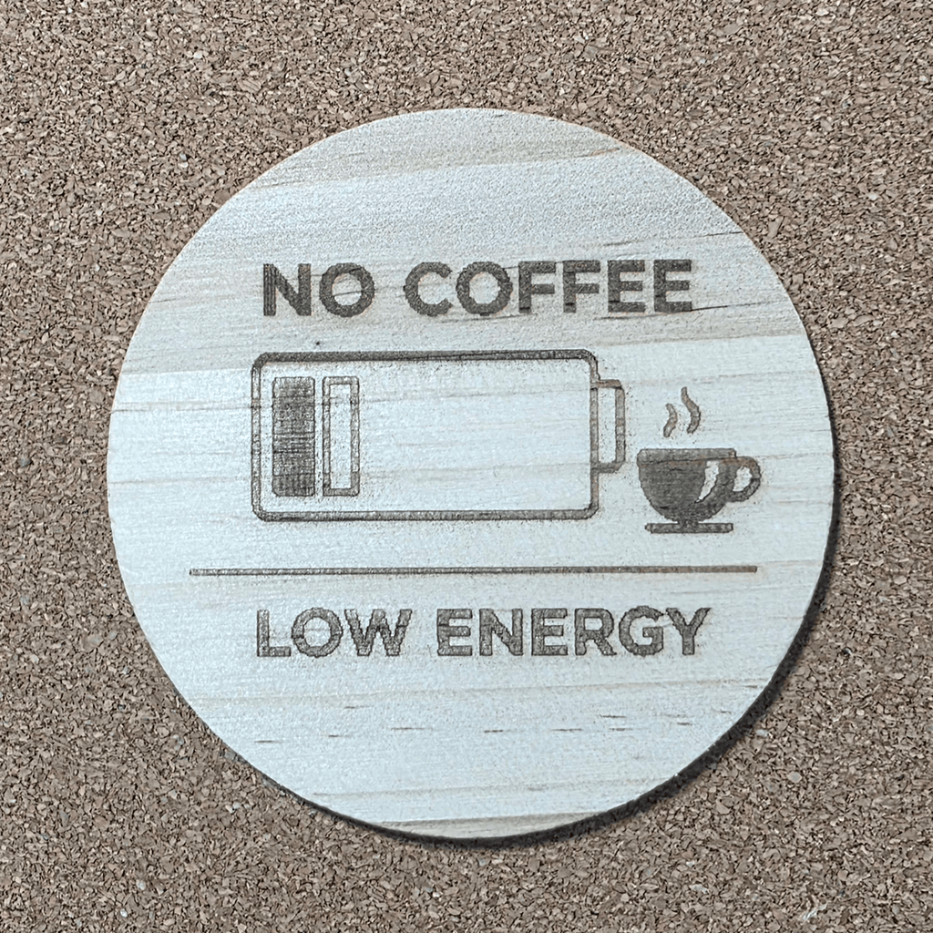 Wooden coffee coaster engraved ‘NO COFFEE / LOW ENERGY’ with battery icon, 100 mm round coaster