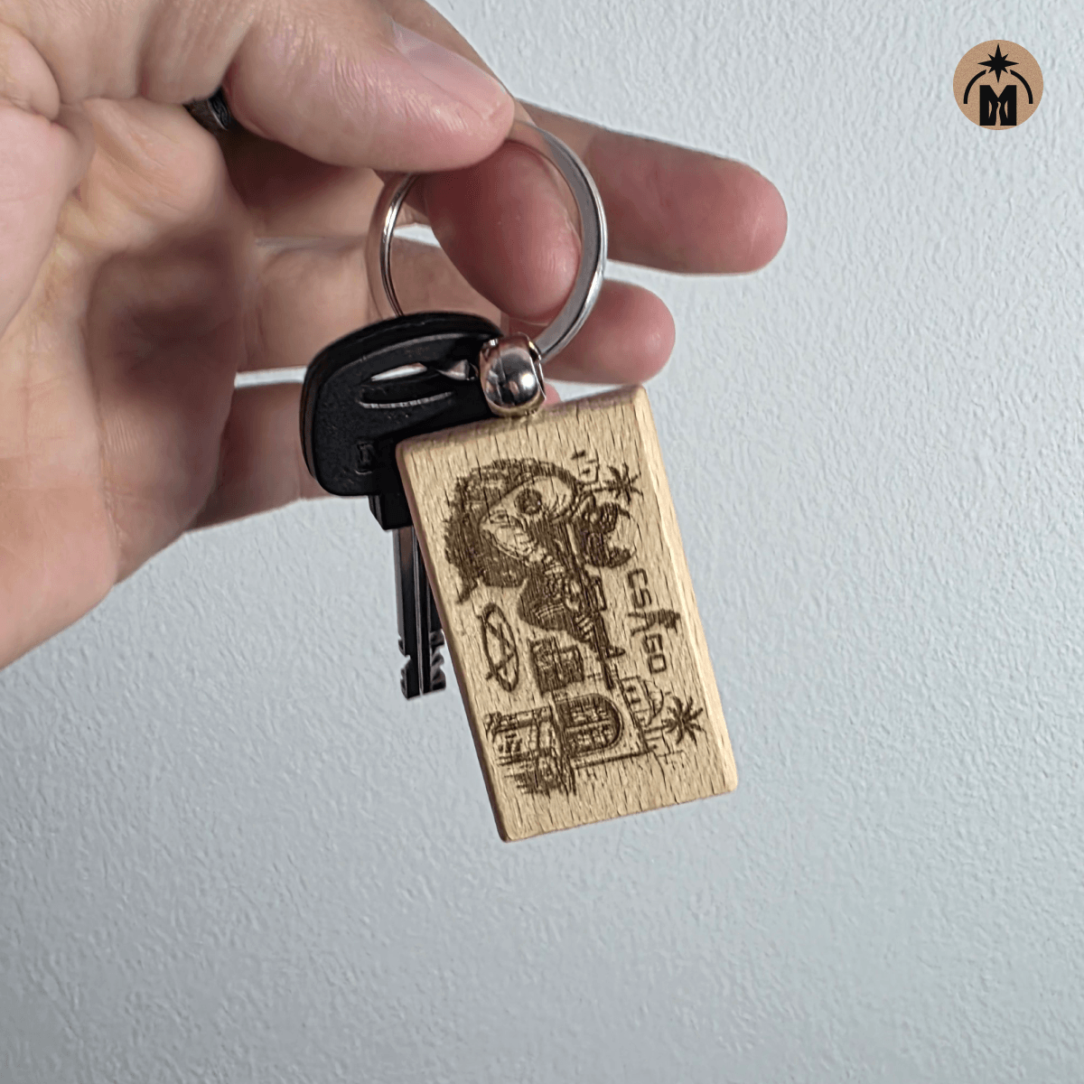 Laser engraved wooden key fob for tactical shooter and gaming fans