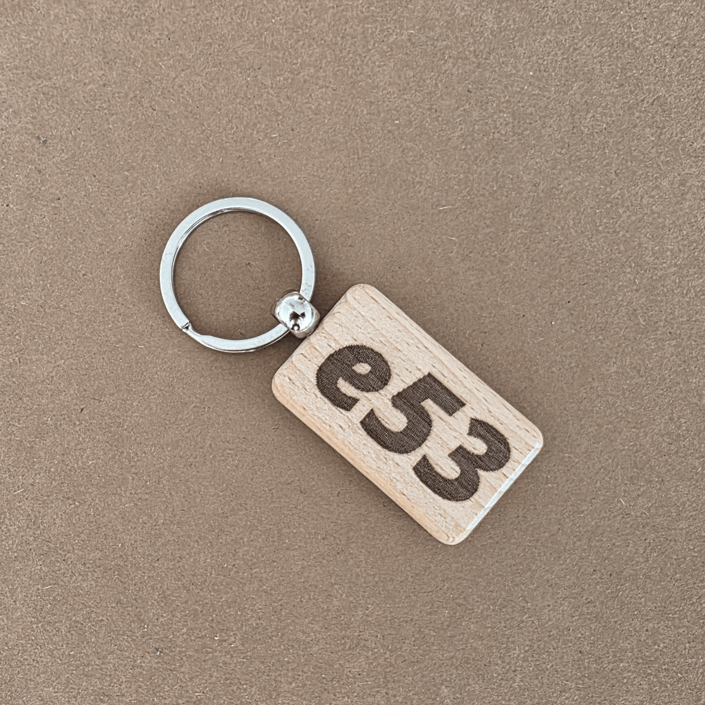 Beech wooden keychain with bold ‘e53’ engraving