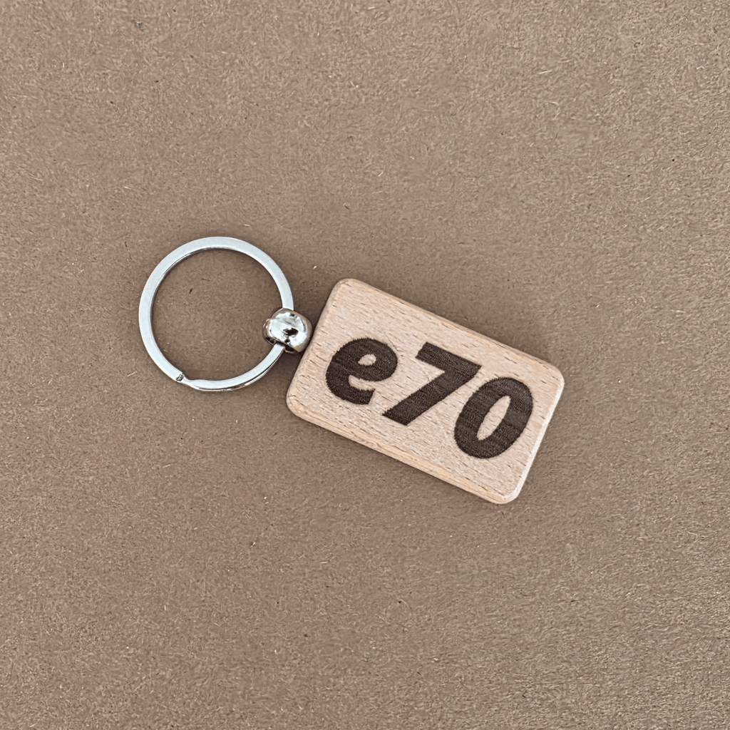 Beech wooden keychain with bold ‘e70’ engraving