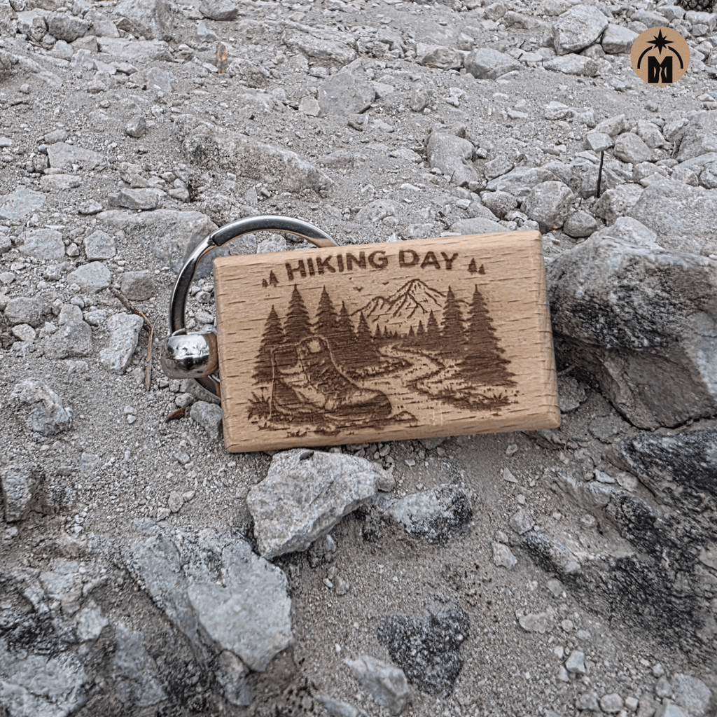 Laser engraved Hiking Day wooden keychain with mountain trail and hiking boot design