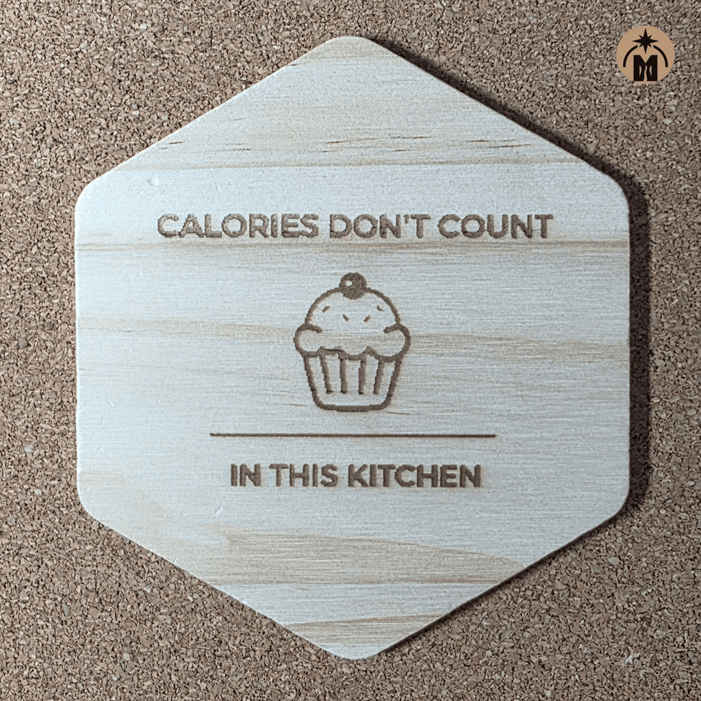 Wooden coaster with cupcake engraving – “Calories Don't Count In This Kitchen”