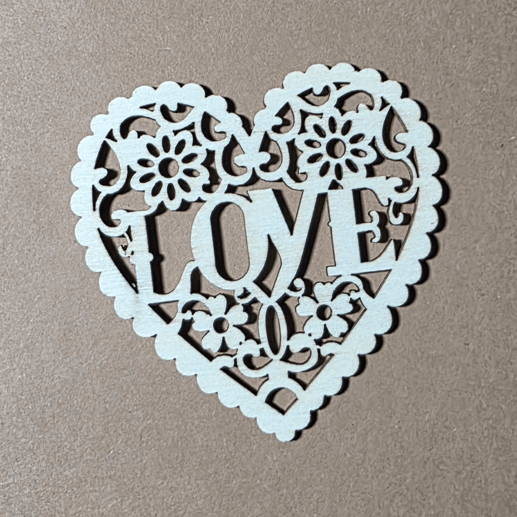 Filigree LOVE heart ornament made of natural wood