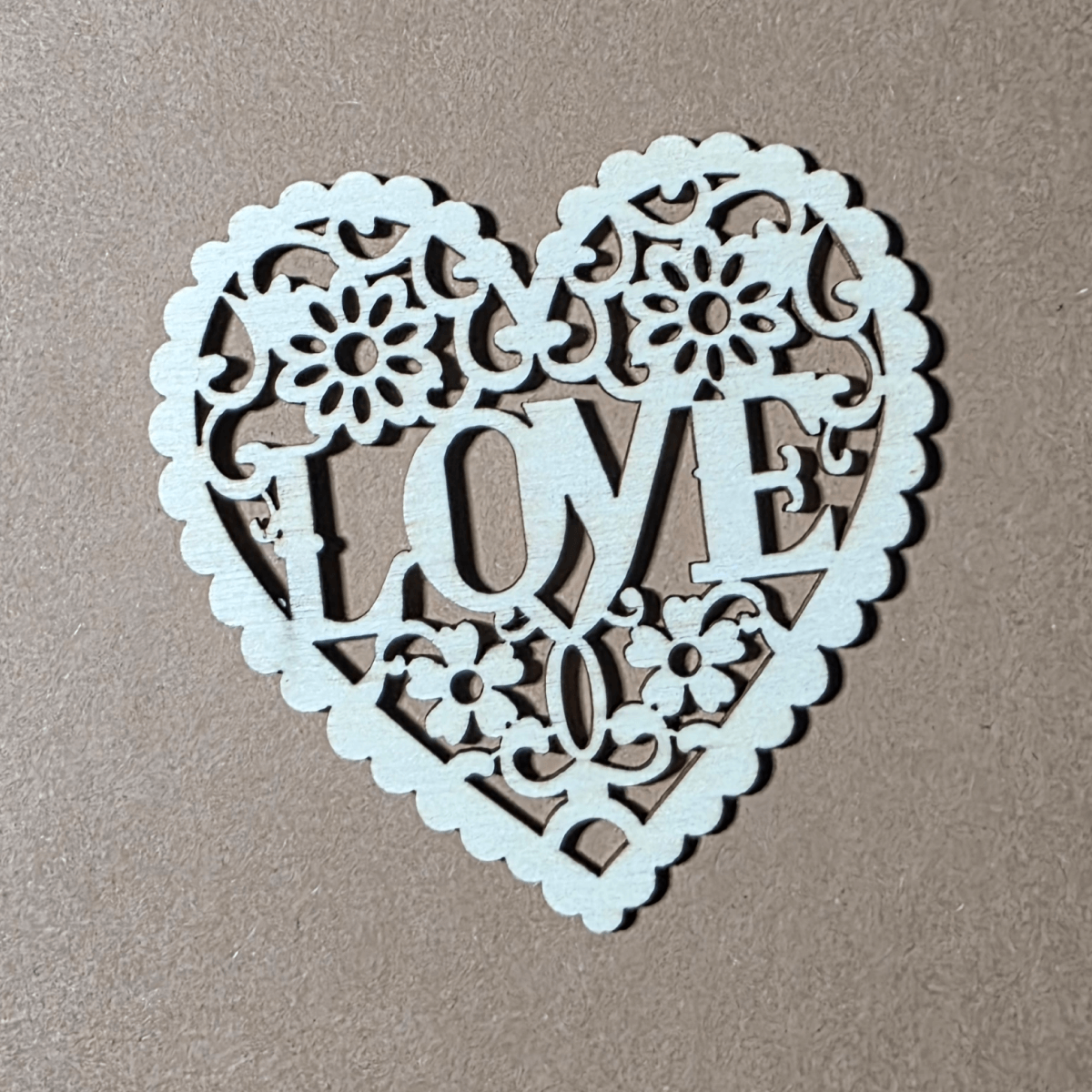 Filigree LOVE heart ornament made of natural wood
