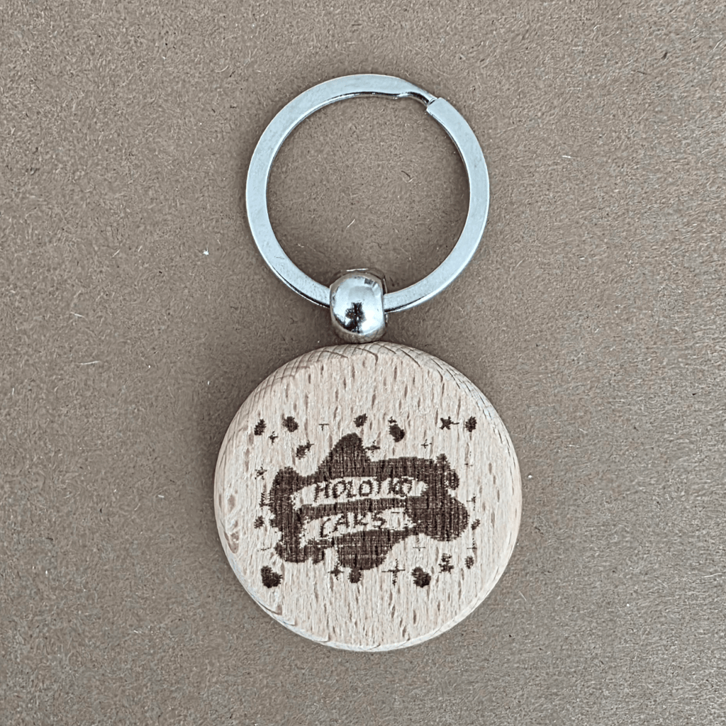MolotkoCars logo engraved on round wooden keychain