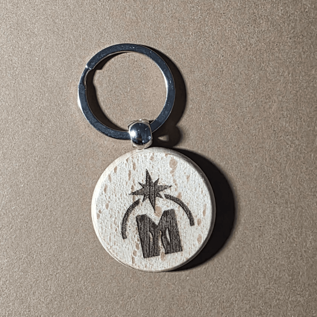 Discreet MolotkoEU logo on wooden keychain