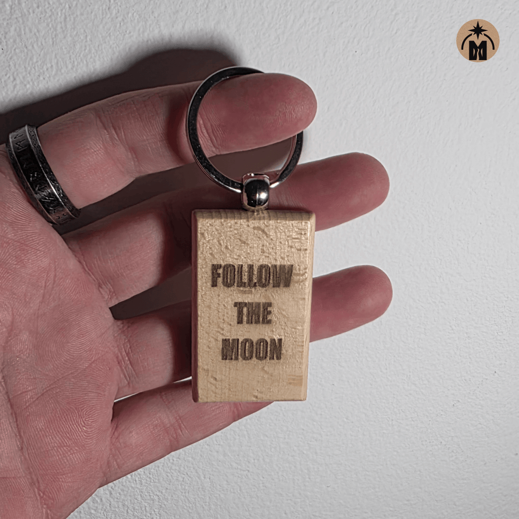 Beech wood keychain engraved with “FOLLOW THE MOON”, metal key ring