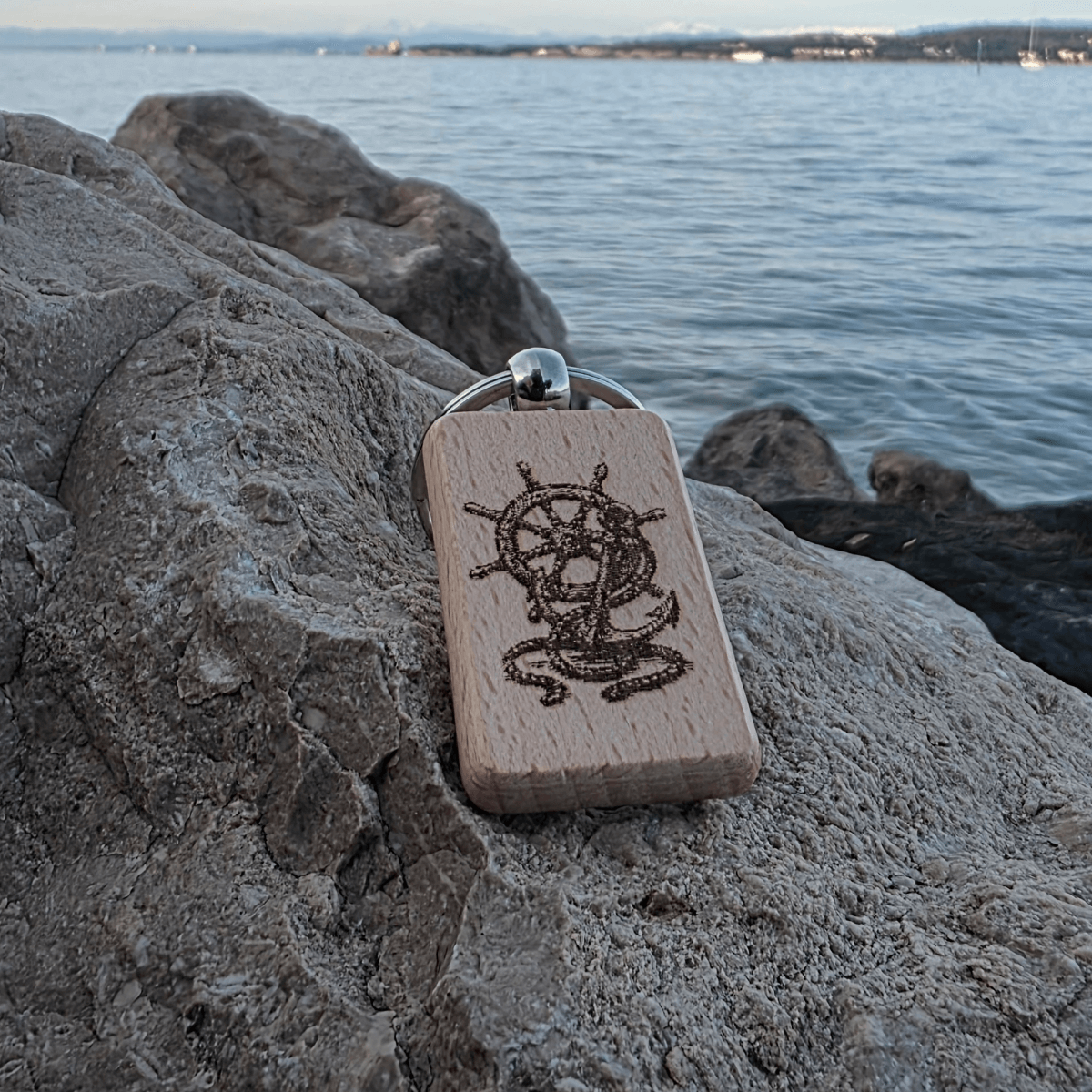 Front view of nautical helm & anchor laser engraving on beech key fob